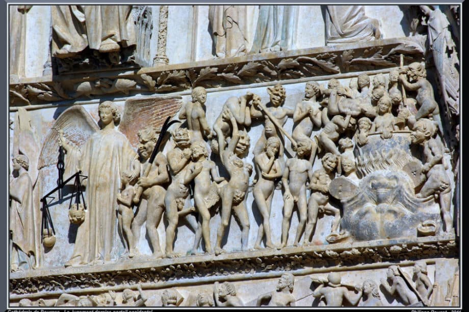 Bas relief sur le tympan d'une église représentant les damnés envoyé en enfer - Image: 'Le Jugement Dernier' http://www.flickr.com/photos/37149125@N04/5722471907 Found on flickrcc.net