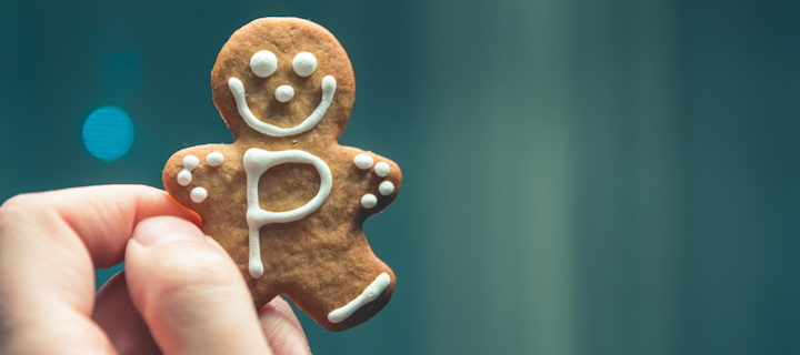 Une main tenant un biscuit - Photo by Pietro De Grandi on Unsplash