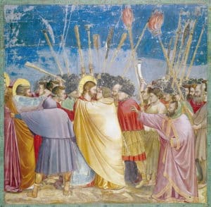 Judas trahit Jésus tout en l'ambrassant - fresque de Giotto