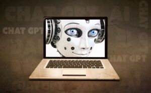 Un ordinateur portable affichant l'image d'un robot souriant - Image by Alexandra_Koch from https://pixabay.com/photos/computer-artificial-intelligence-ai-7718768/